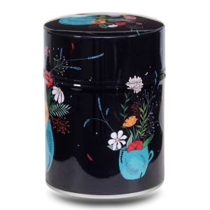 Metal tea caddy illustrated with a multicolored bouquet in a blue vase on a black background