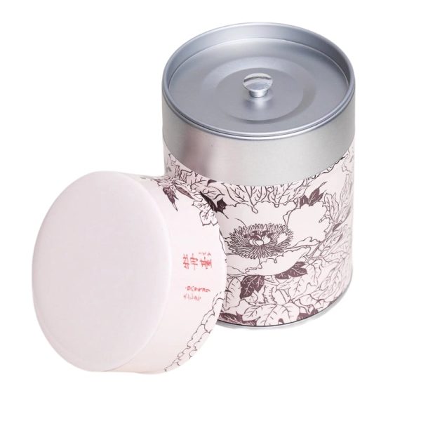 Boite à thé en métal illustrée d'un dessin de fleurs japonaises avec des caractères japonais sur fond rose/beige - boite ouverte