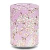 caja de té rosa malva con flores de cerezo blancas