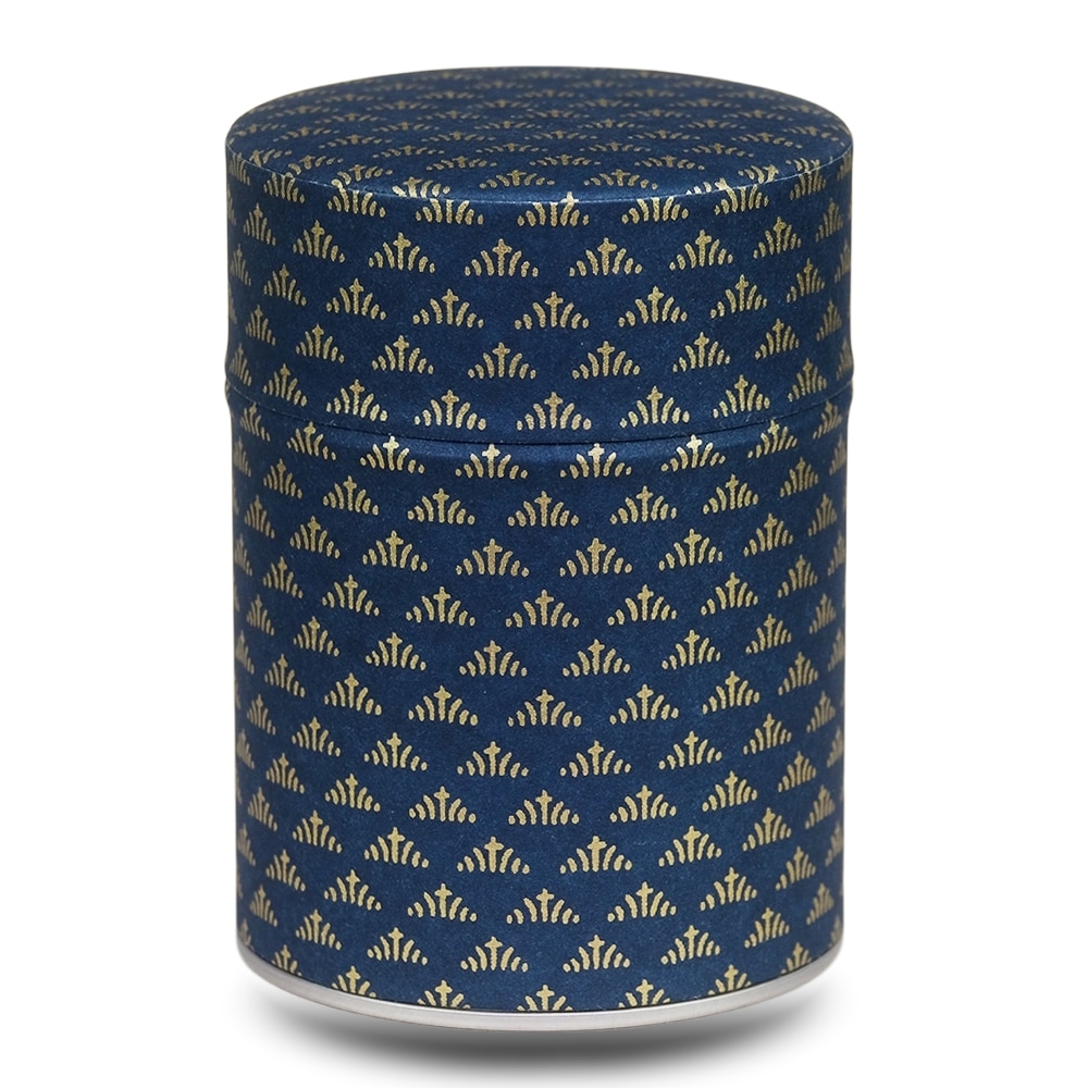 caja de té azul con motivos geométricos dorados