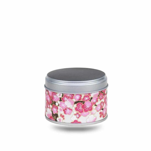Small metal tea box covered with beige washi paper and pink cherry blossoms