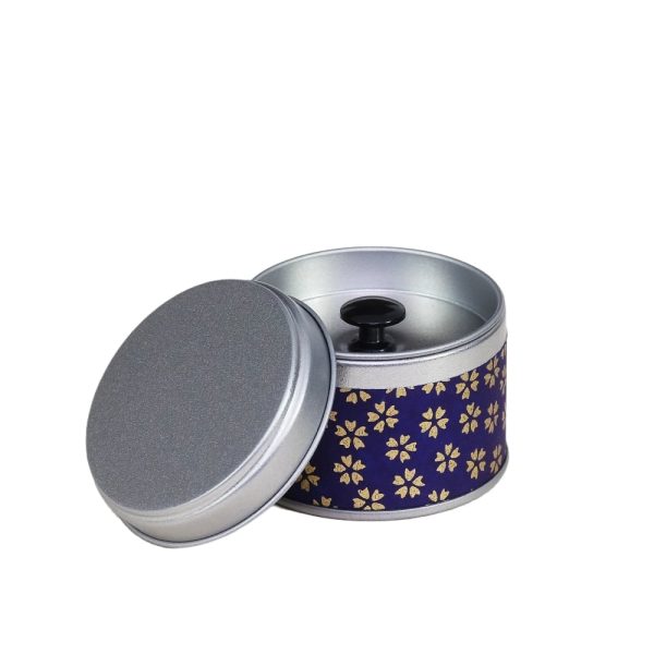 small metal travel tea box covered with washi paper - open