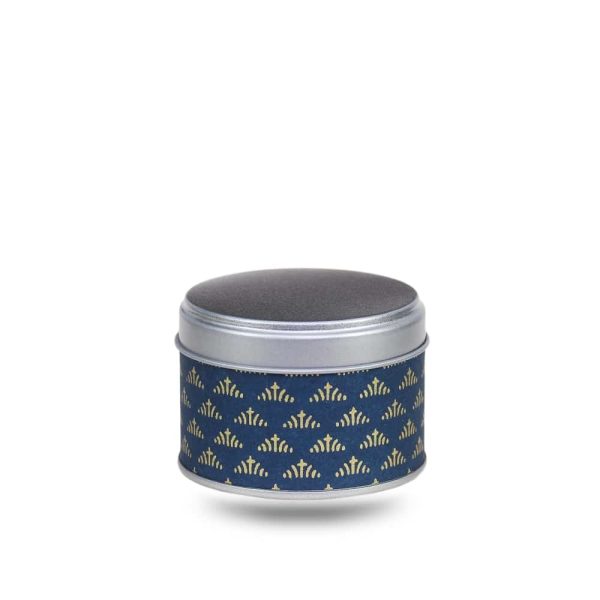 Small metal tea box covered in blue washi paper with gold geometric motifs