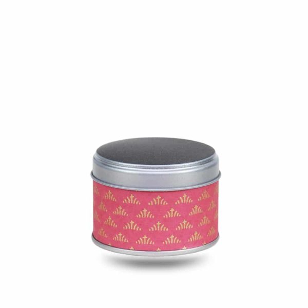 Small metal tea box covered in red washi paper with geometric gold motifs