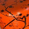Natsume laqué rouge avec un motif de pruniers sous la lune